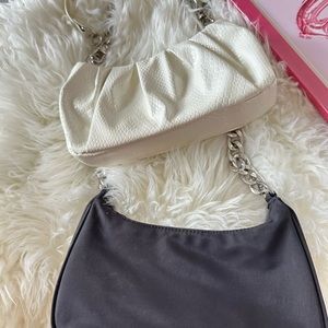 Two hand bags together <3